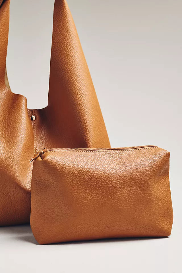 The Love Knot Slouchy Bag Woven Buckle Edition by Anthropologie