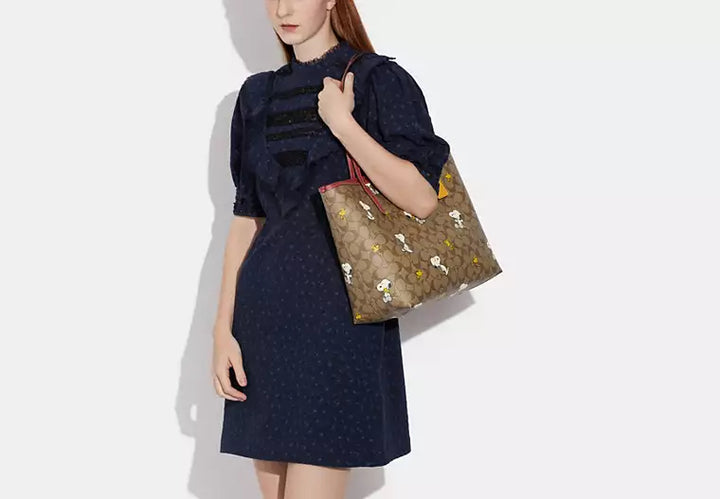 Coach X Peanuts City Women's Tote Bag In Signature Canvas With Snoopy Print