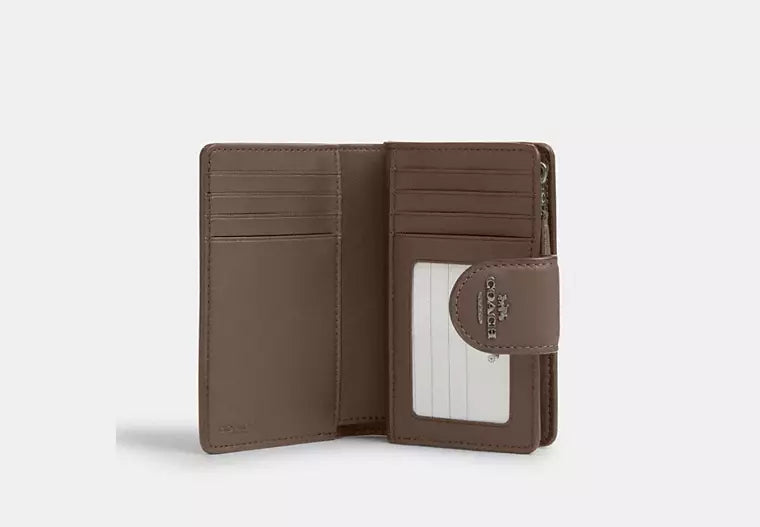 Coach Women's Medium Corner Zip Wallet in Signature Canvas