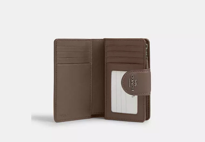 Coach Women's Medium Corner Zip Wallet in Signature Canvas