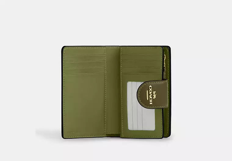 Coach Women's Medium Corner Zip Wallet in Signature Canvas