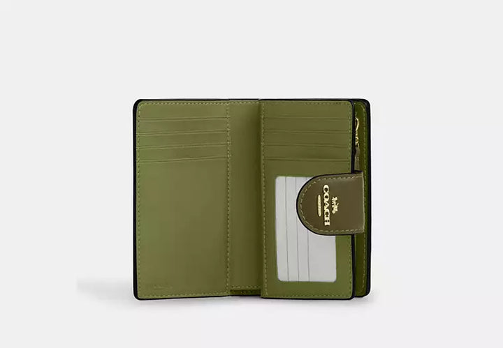 Coach Women's Medium Corner Zip Wallet in Signature Canvas