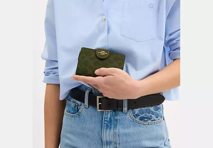 Coach Women's Medium Corner Zip Wallet in Signature Canvas