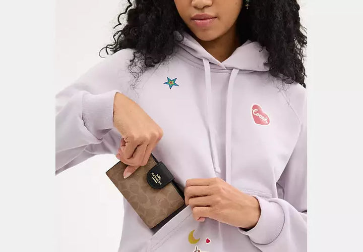 Coach Women's Medium Corner Zip Wallet in Signature Canvas