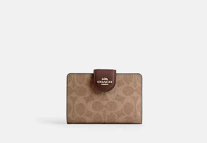 Coach Women's Medium Corner Zip Wallet in Signature Canvas