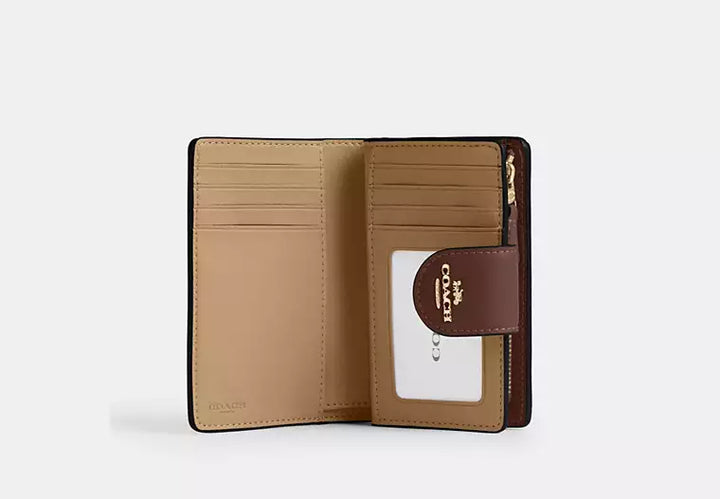 Coach Women's Medium Corner Zip Wallet in Signature Canvas