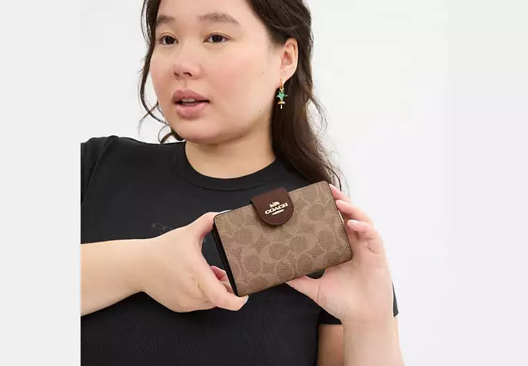 Coach Women's Medium Corner Zip Wallet in Signature Canvas