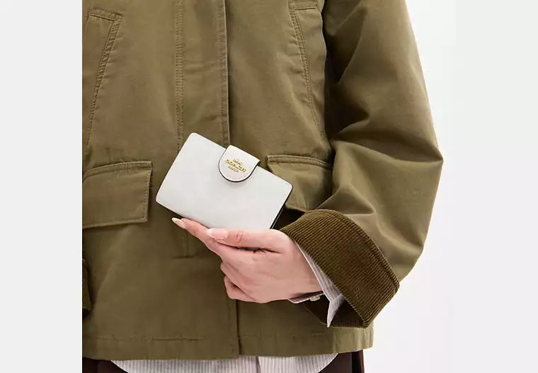 Coach Women's Medium Corner Zip Wallet in Signature Canvas