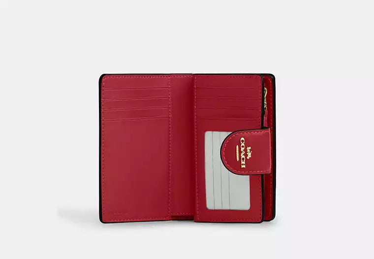 Coach Women's Medium Corner Zip Wallet in Signature Canvas