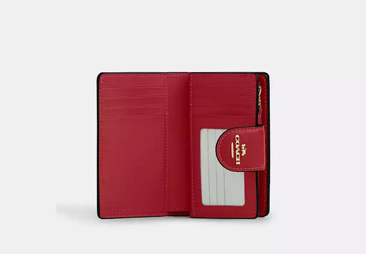 Coach Women's Medium Corner Zip Wallet in Signature Canvas