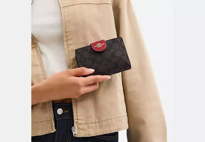 Coach Women's Medium Corner Zip Wallet in Signature Canvas