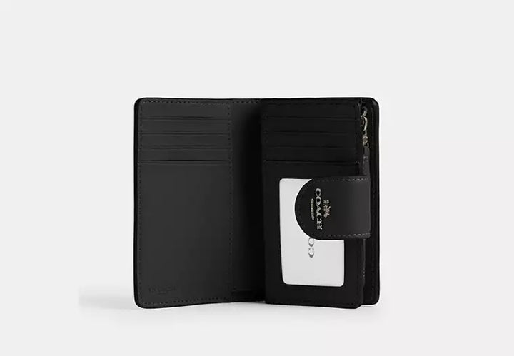 Coach Women's Medium Corner Zip Wallet in Signature Canvas