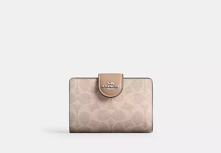 Coach Women's Medium Corner Zip Wallet in Signature Canvas
