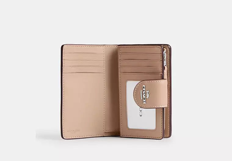 Coach Women's Medium Corner Zip Wallet in Signature Canvas