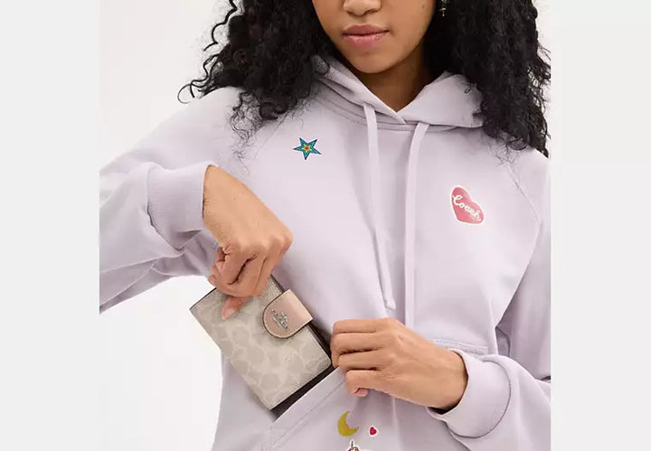 Coach Women's Medium Corner Zip Wallet in Signature Canvas